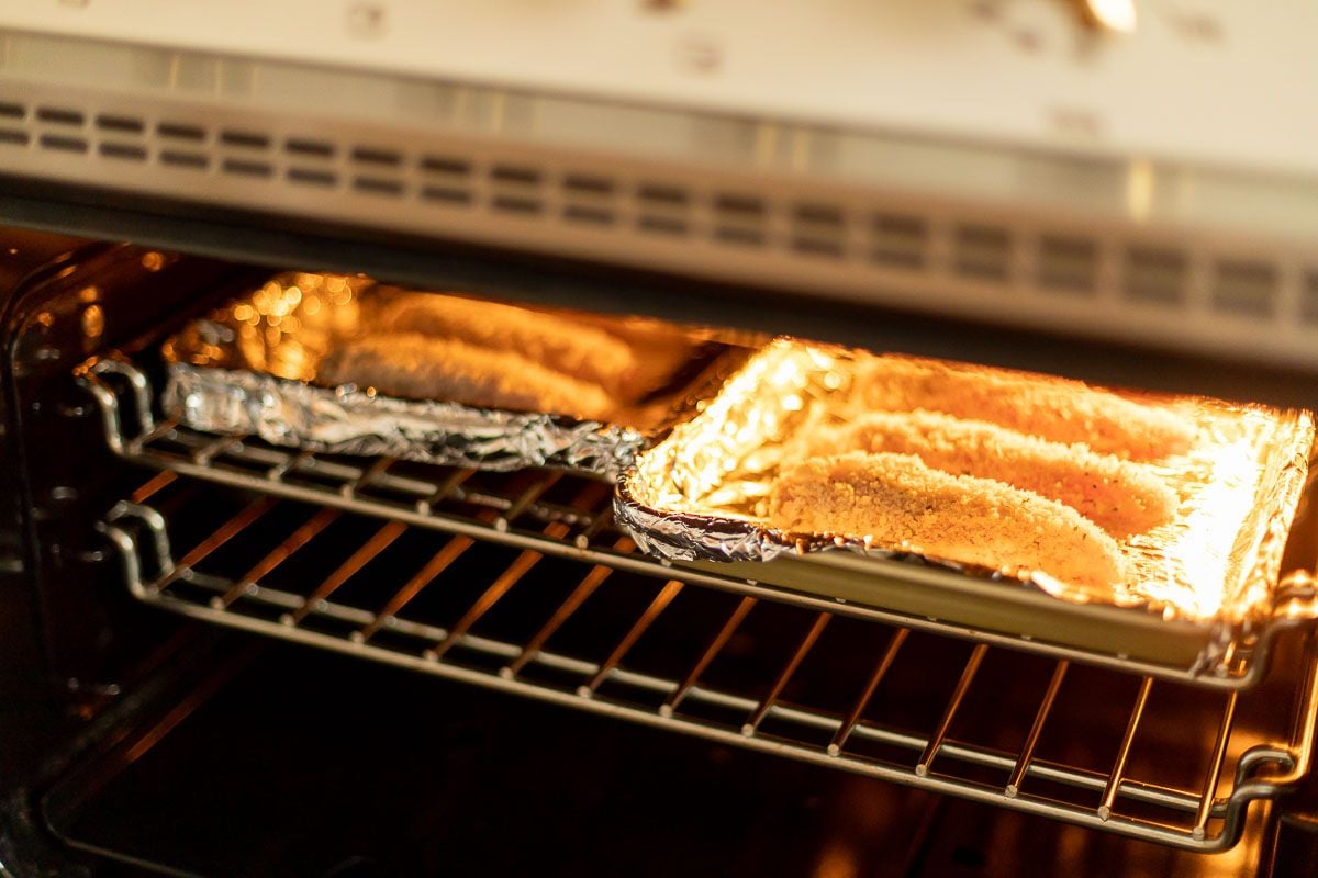 baked panko chicken on a baking sheet in the oven