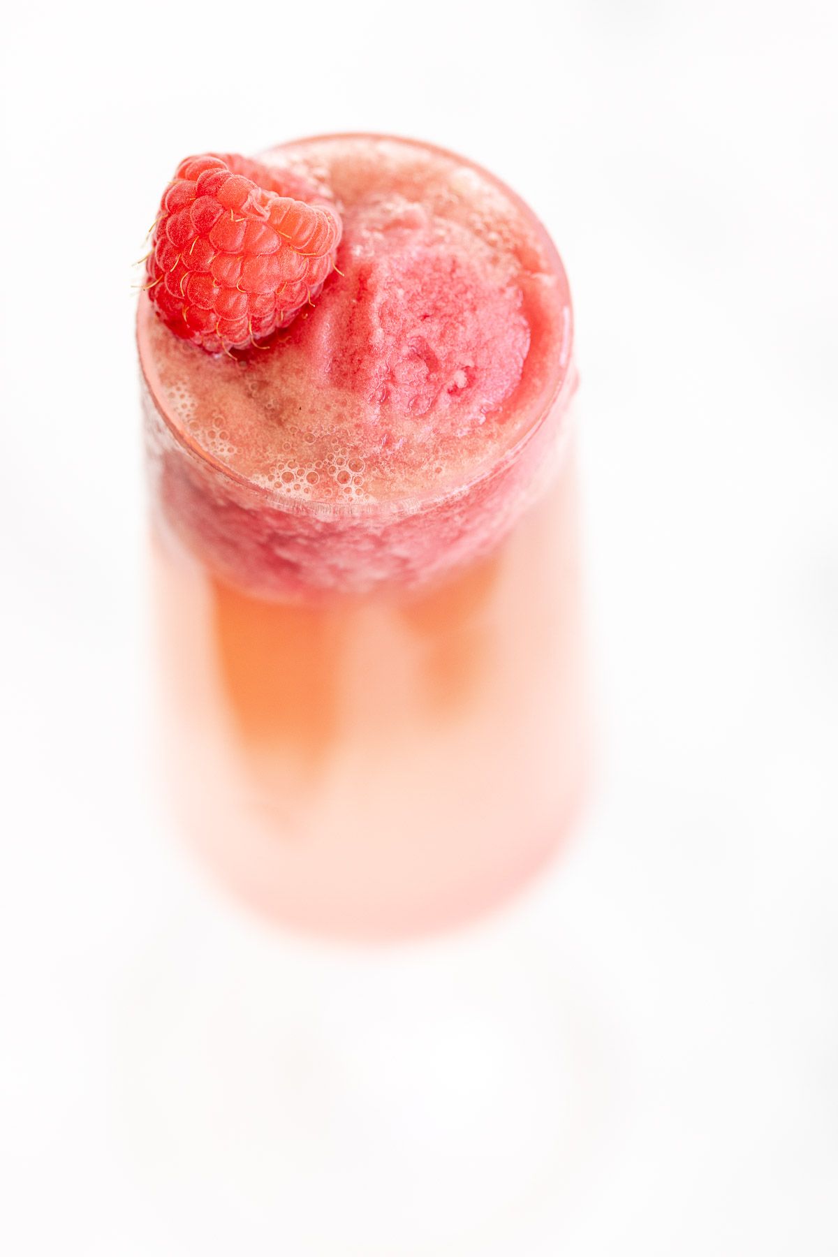 A single glass of a sorbet mimosa