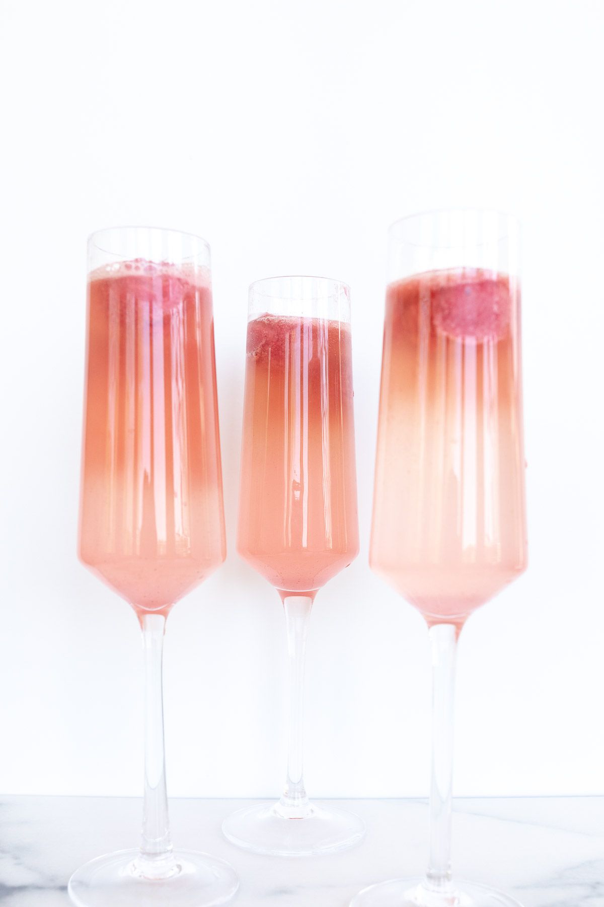 Three glasses of sorbet mimosas