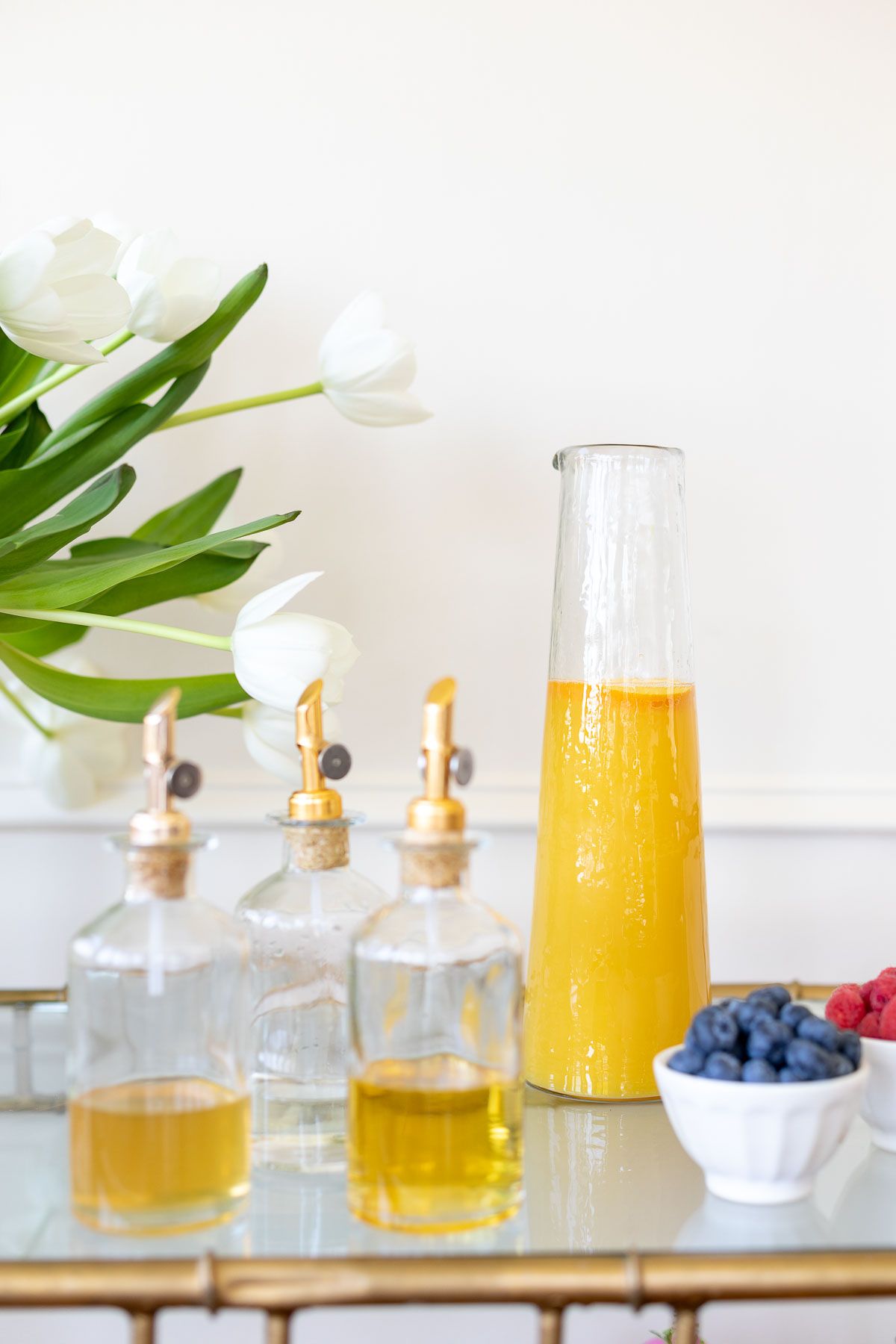A small bar area set up with bottomless mimosas