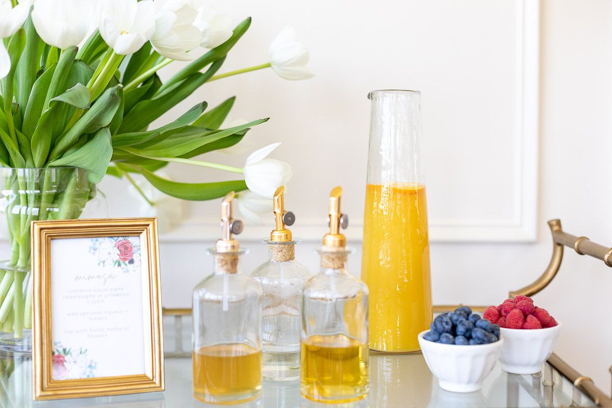A small bar area set up with bottomless mimosas