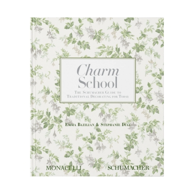 a coffee table book titled "Charm School"