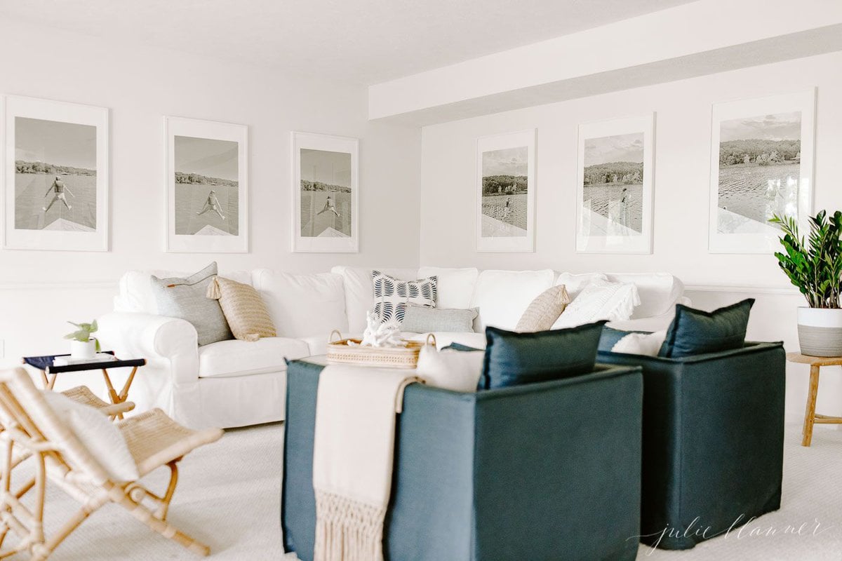 A white living room with a zz plant in the corner