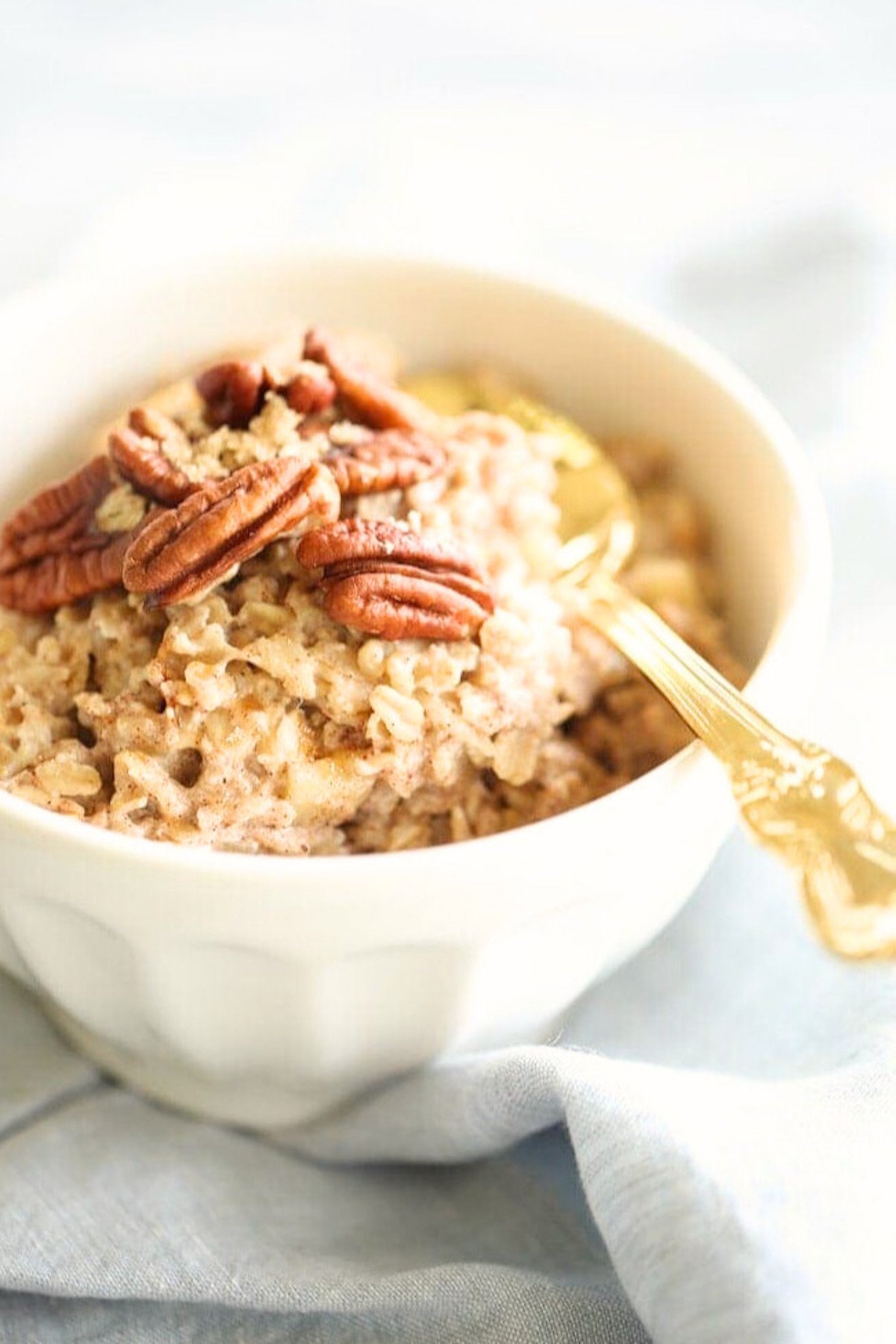 apple pie oatmeal in a white bowl