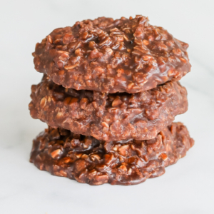 Three chocolate cookie no bake desserts stacked on top of each other.