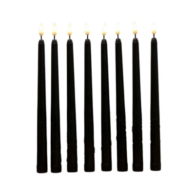 black candles as part of an Amazon Halloween shopping guide.