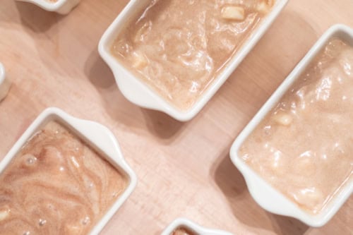 apple cinnamon bread batter in a mixing bowl.