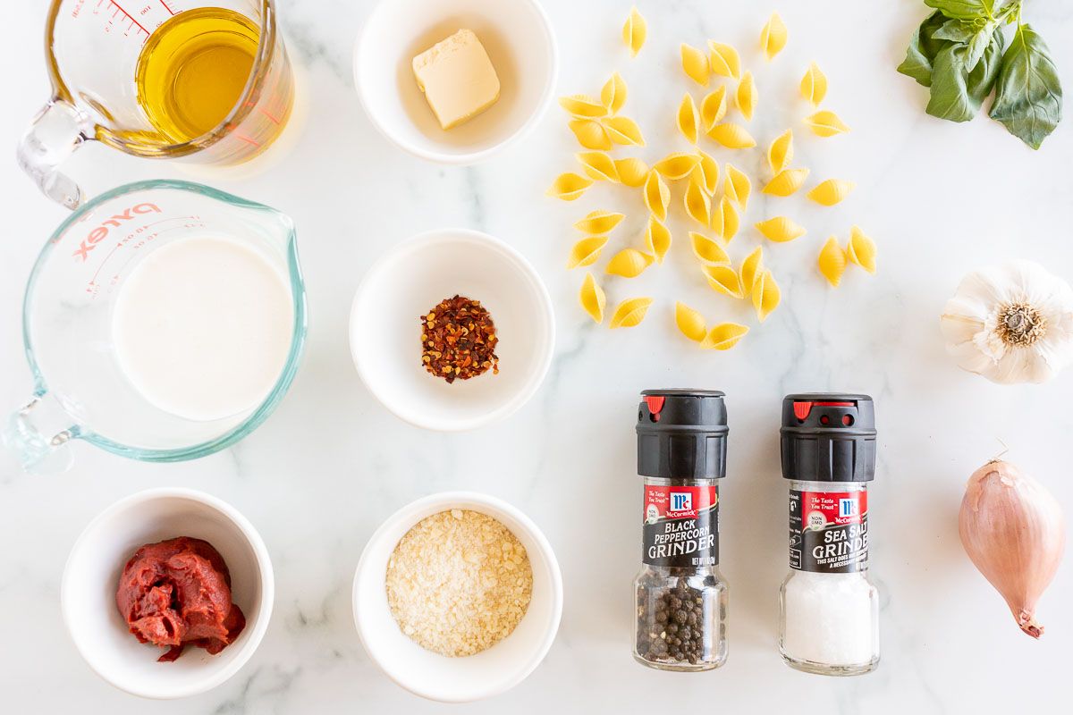 Ingredients for Gigi Hadid's pasta recipe, laid out on a marble countertop.