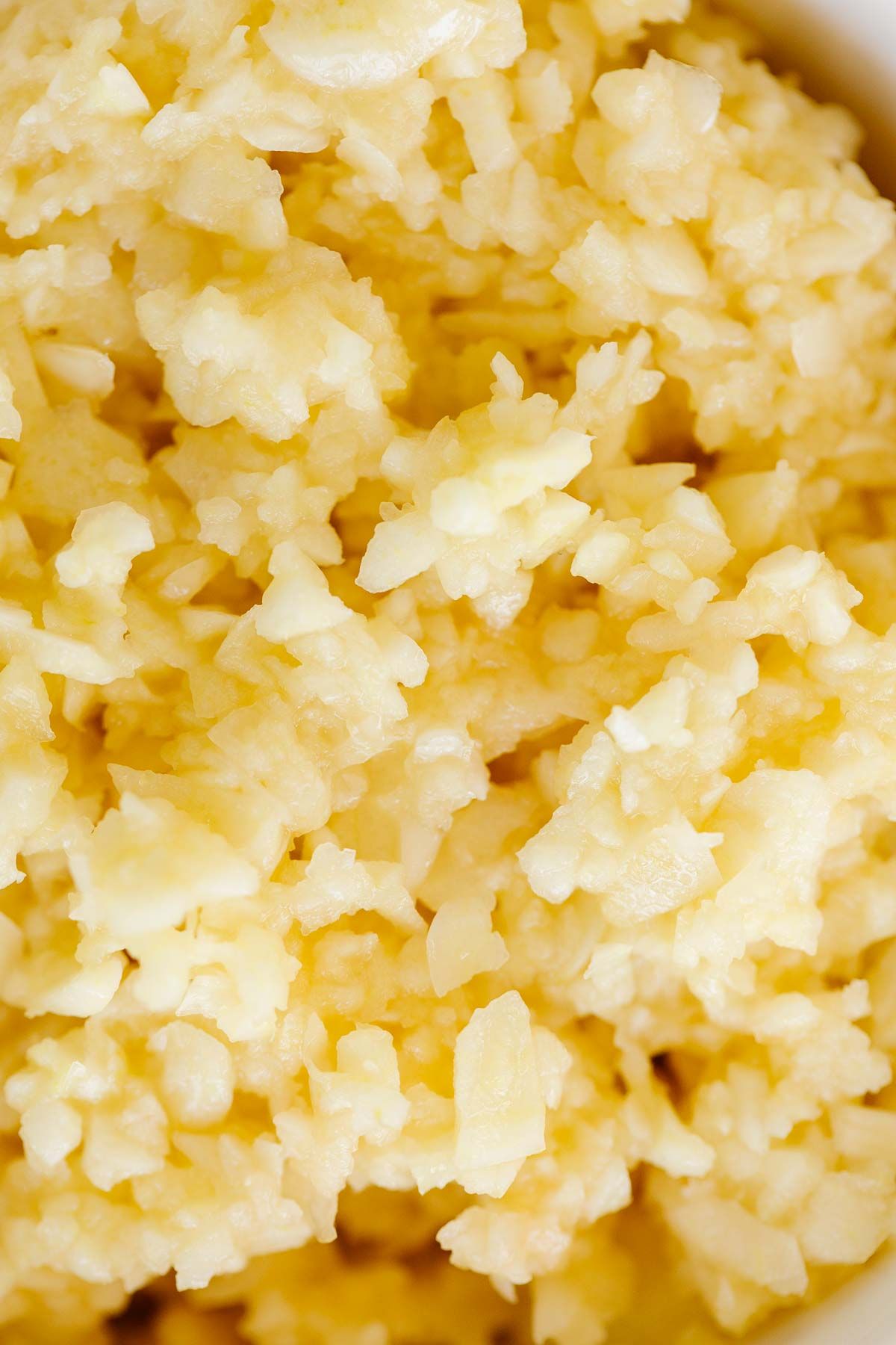 A close up of minced garlic