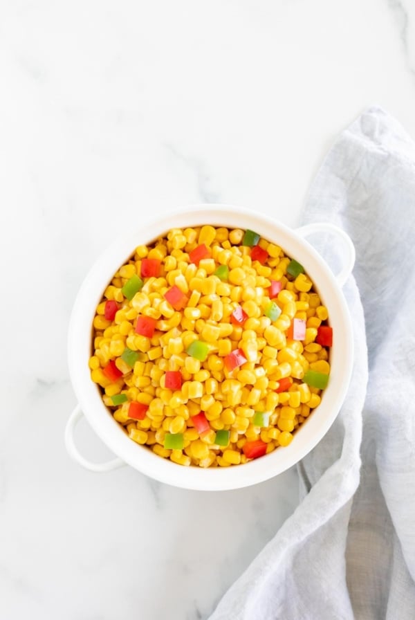 Homemade Mexicorn substitute in a white serving bowl, placed on a white marble countertop.