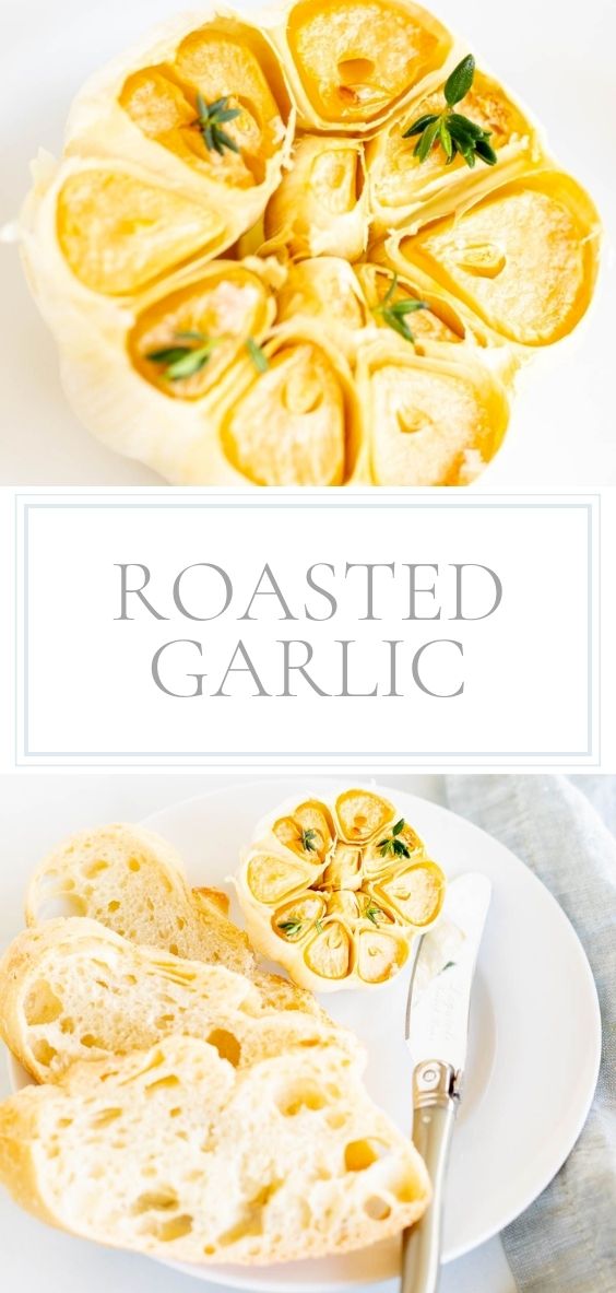 On a round white plate there is a head of roasted garlic next to a couple pieces of bread.