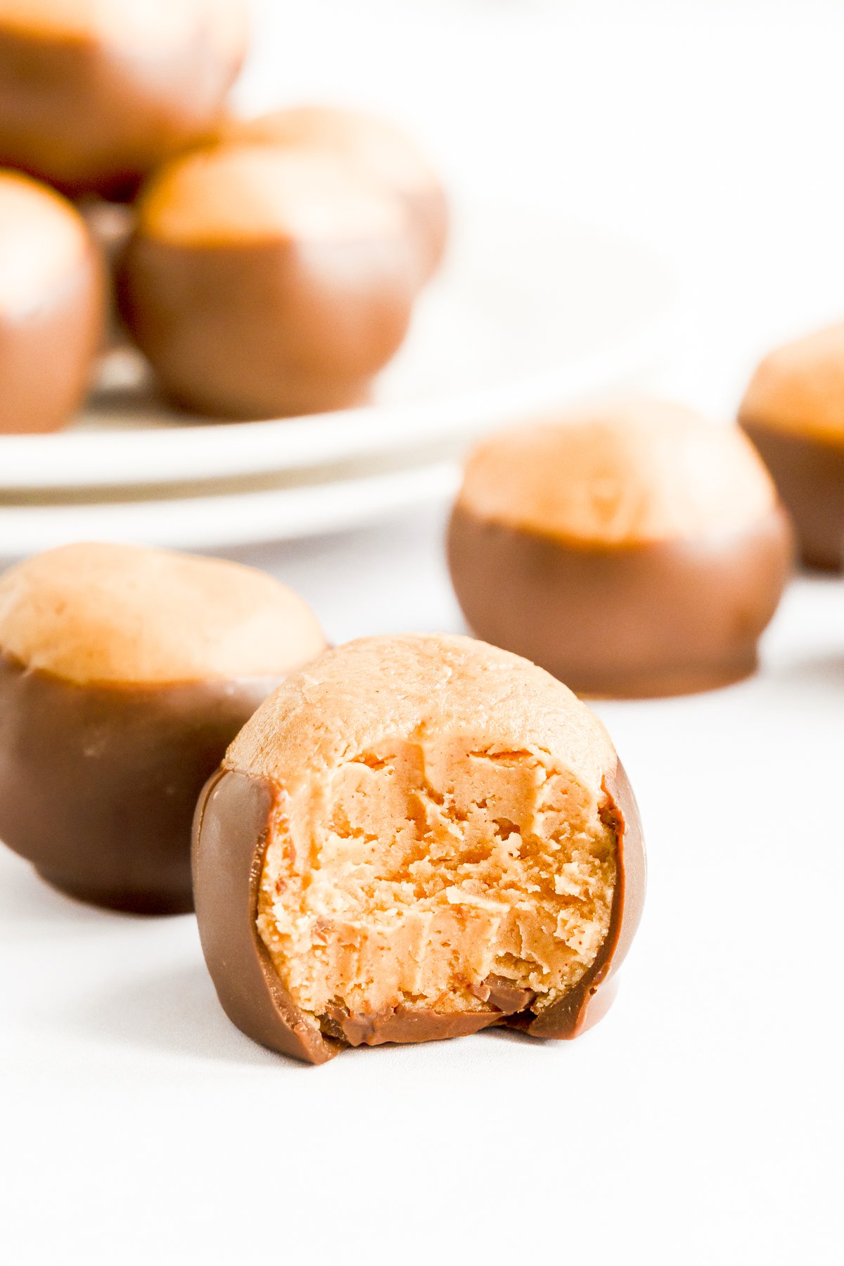 A plate of buckeyes - chocolate covered peanut butter balls.