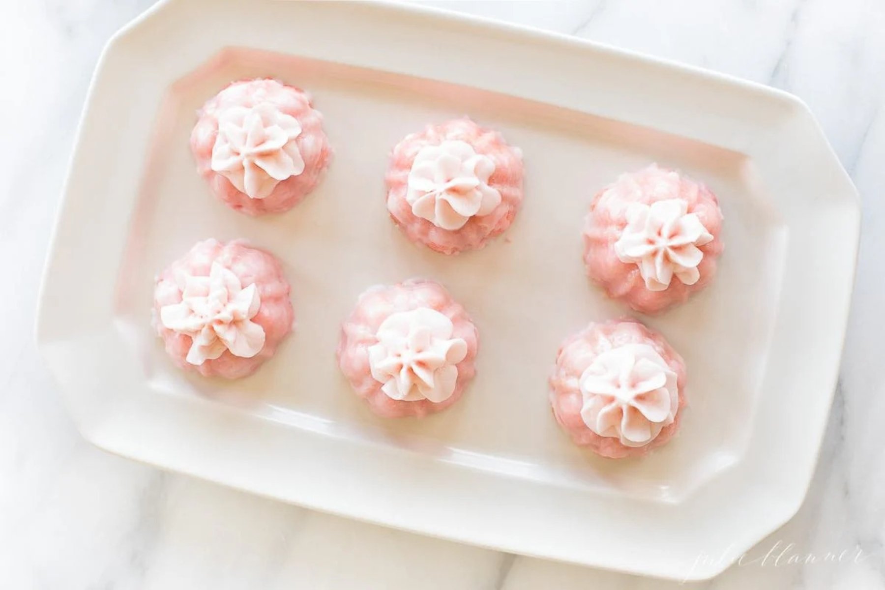 pink champagne cupcakes with glaze and icing