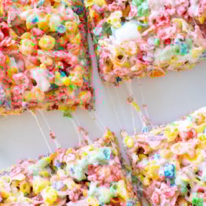 Overhead view of 4 Fruity Pebbles Treats with sticky marshmallow
