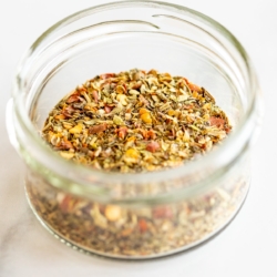 oregano seasoning in a small glass jar.