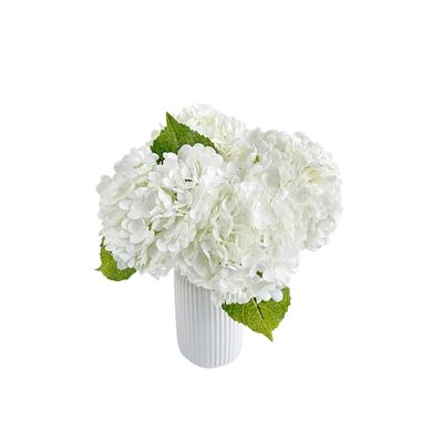 white faux hydrangea in a vase