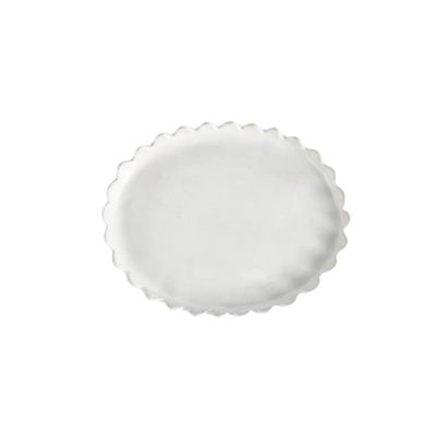 a white scalloped tray