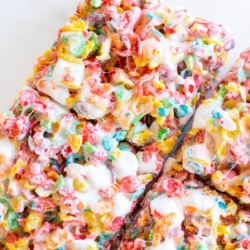 fruity pebble treats sliced into servings.