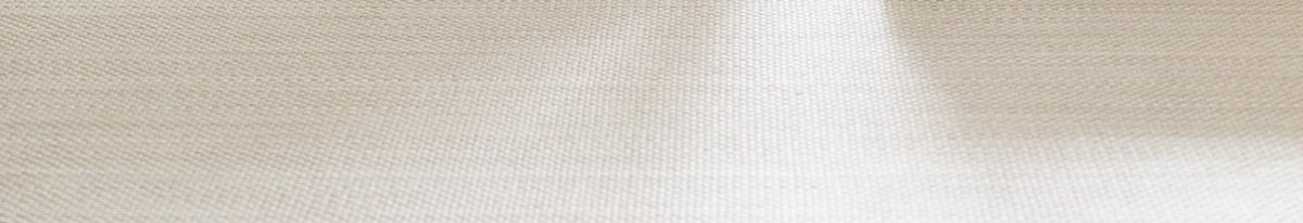 A close up of a sisal rug.