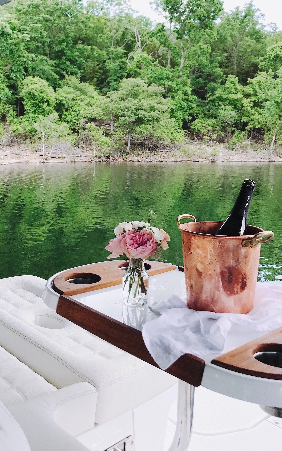 A boat with a built in table for boat snacks.