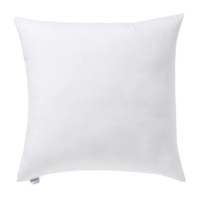 A square white pillow, complete with a small tag on one edge, offers a pristine look against a plain background. Ideal for enhancing comfort, this pillow is designed to perfectly accommodate various pillow inserts.