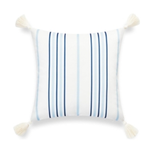 A blue and white striped pillow with tassels, similar to Serena & Lily dupes.