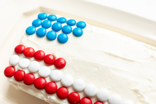 A funfetti dip flag in the process of being decorated.