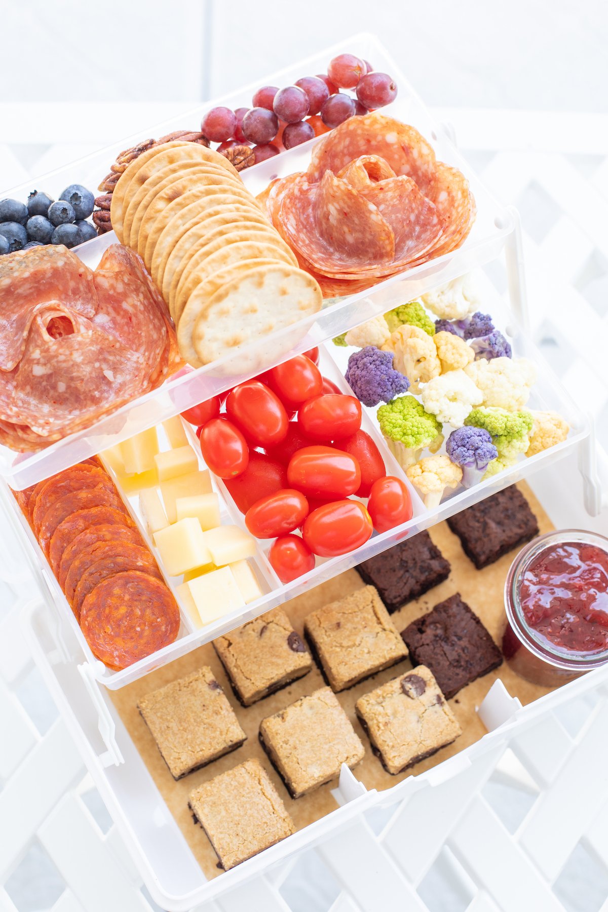 A snackle box on a white table.