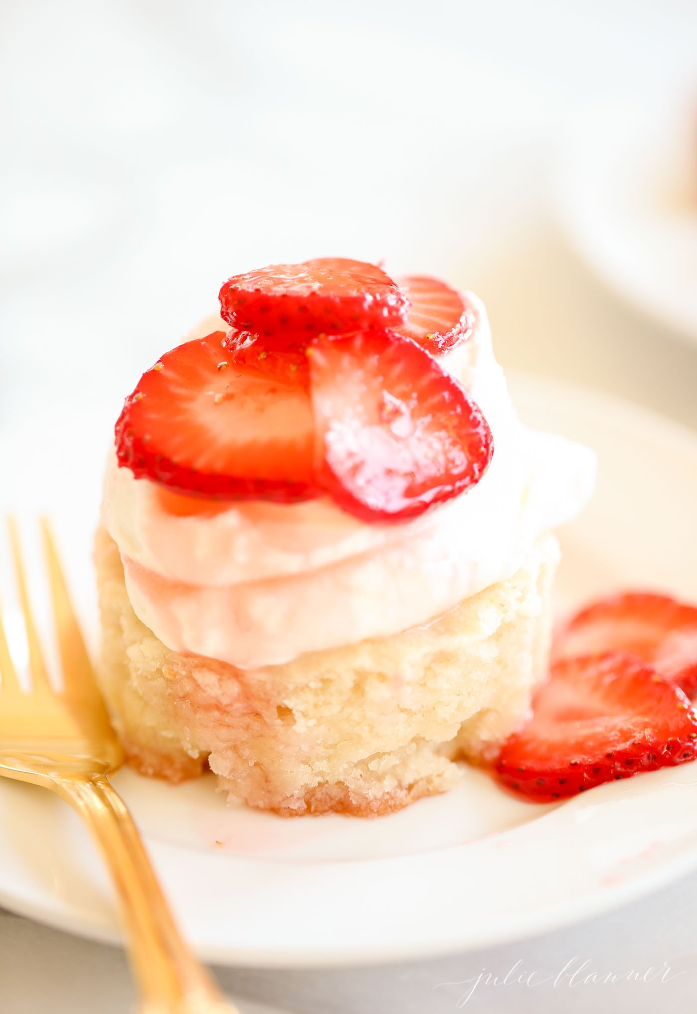 strawberry shortcake on a white plate.