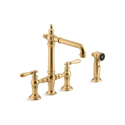 A bridge kitchen faucet with two handles and a sprayer.