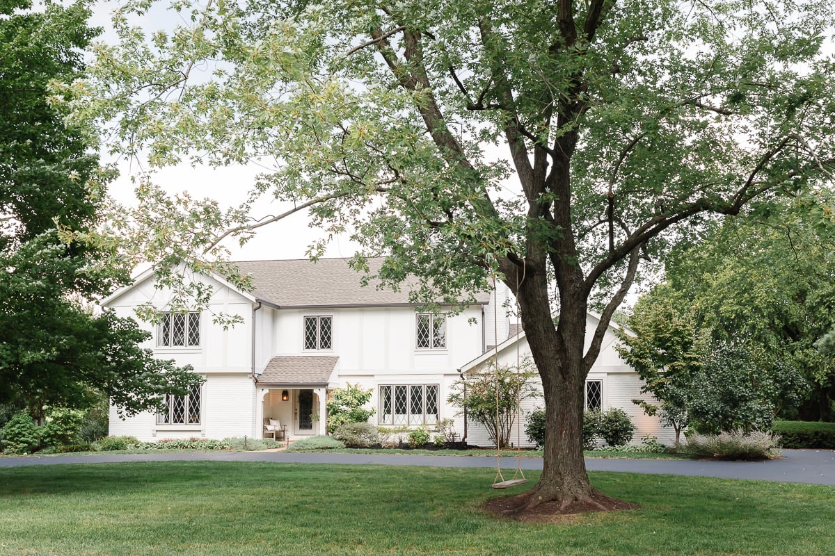 neutral tudor home with diamond windows