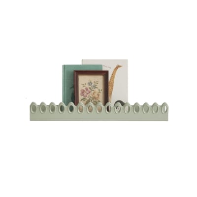 A green scalloped floating shelf from Julia Berolzheimer for Target