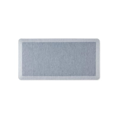 A blue anti fatigue kitchen mat.