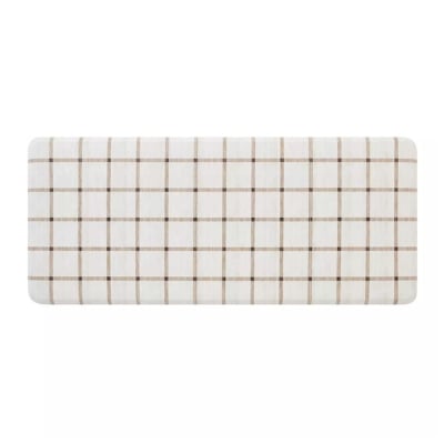 An anti-fatigue kitchen mat with a white and brown checkered pattern on a white background.