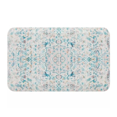 A blue and white anti fatigue kitchen mat.