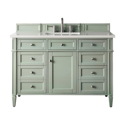 A green bathroom vanity
