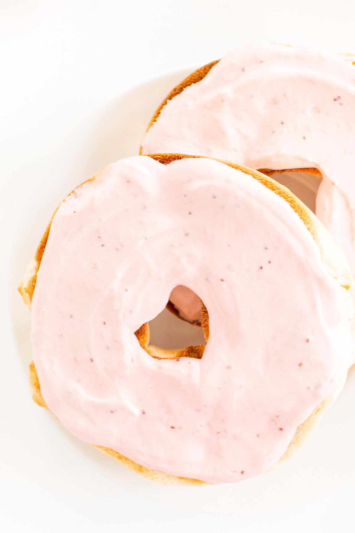 Strawberry cream cheese on a bagel.