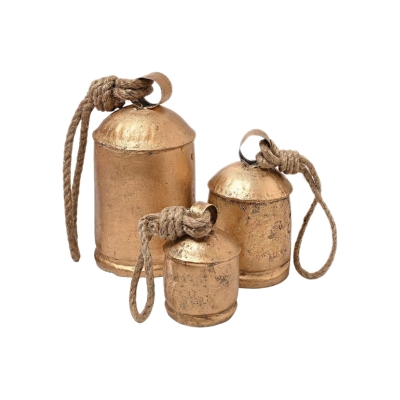 A trio of brass bells on a white background.