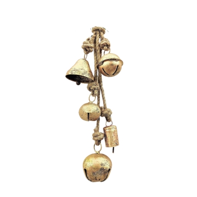 Brass bells hanging from a rope on a white background.