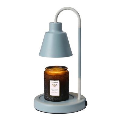 A blue lamp with a candle on it.
