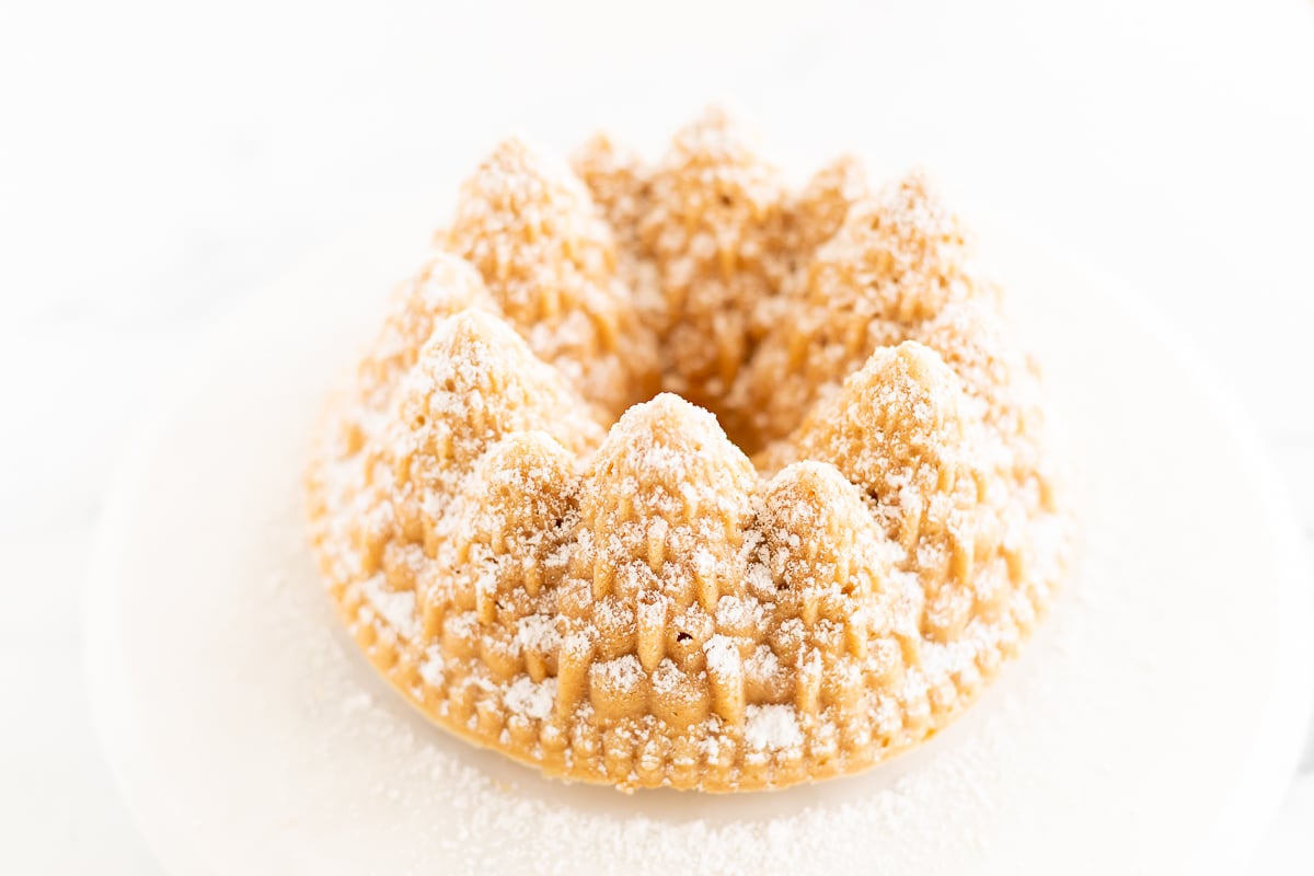 An easy pound cake recipe with powdered sugar on top.