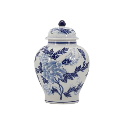 A blue and white jar with a lid.