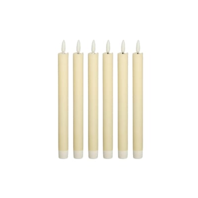 A set of five yellow LED candles on a white background.