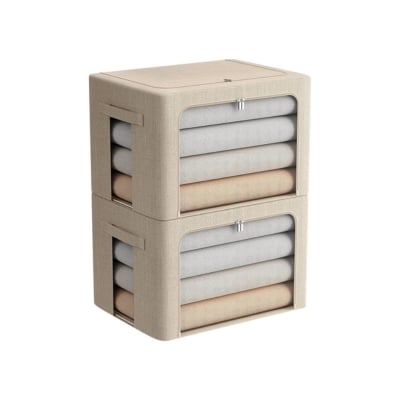 A stack of storage containers filled with clothes.
