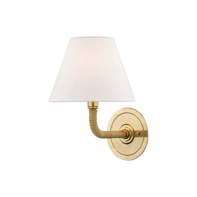 A gold bathroom sconce with a white shade.