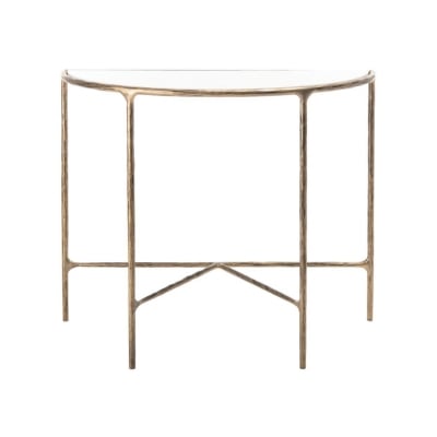 A gold console table with a glass top, perfect for achieving the RH Look for Less.