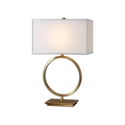 A gold table lamp with a white shade, offering an affordable Arhaus look for less.