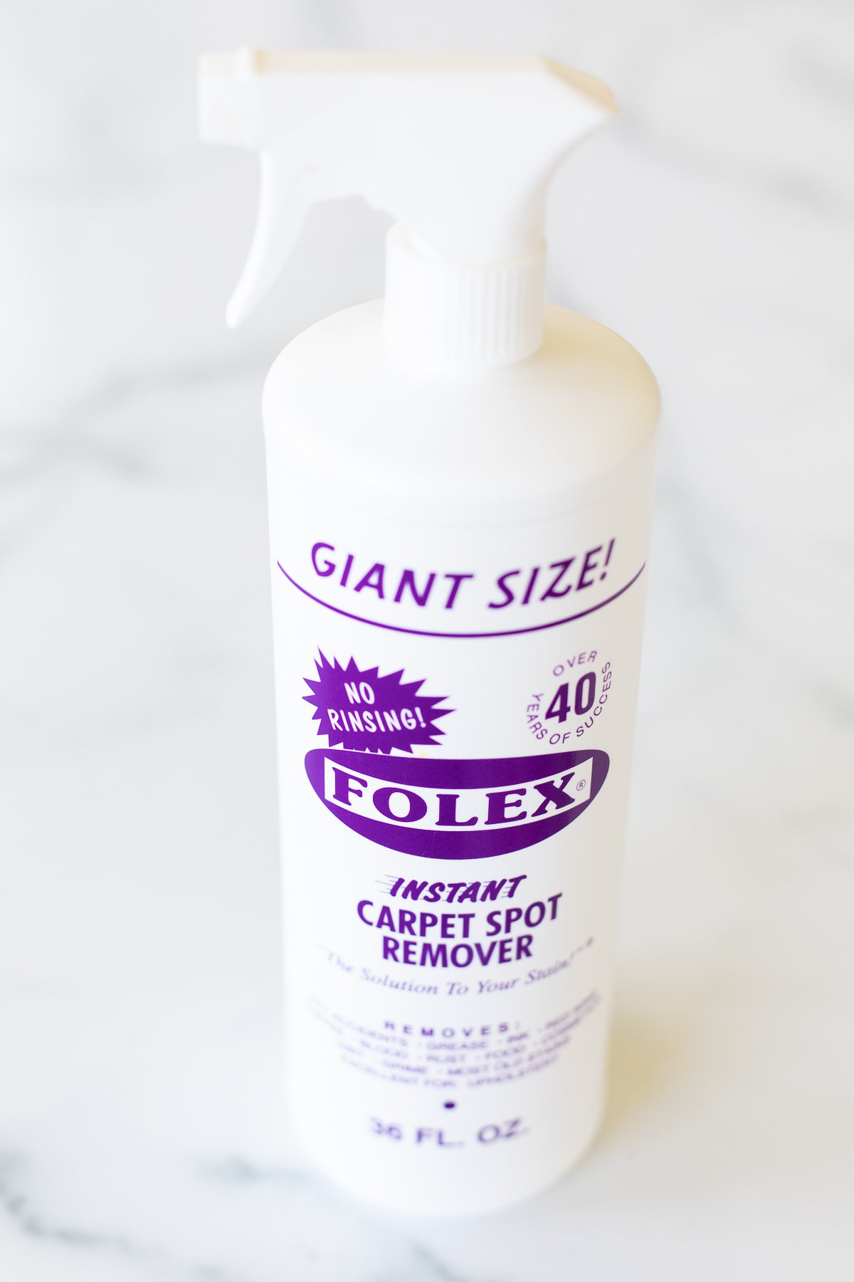 A bottle of giant size folex carpet spot cleaner.