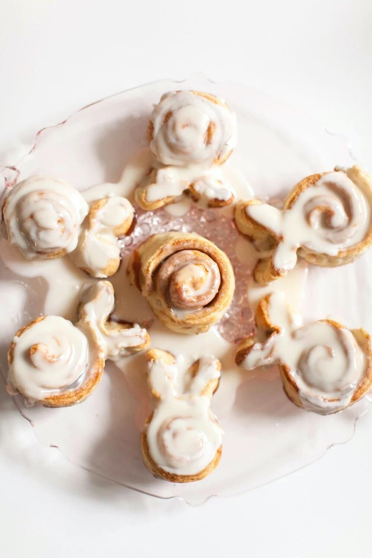 Bunny shaped cinnamon rolls on a pink platter