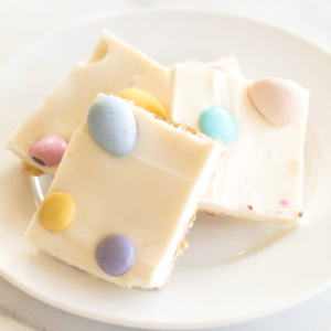 An easy Easter dessert idea of Easter toffee decorated with candy eggs